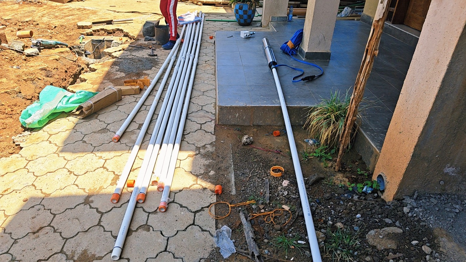 Submersible borehole pump and rising main pipes prepared for installation